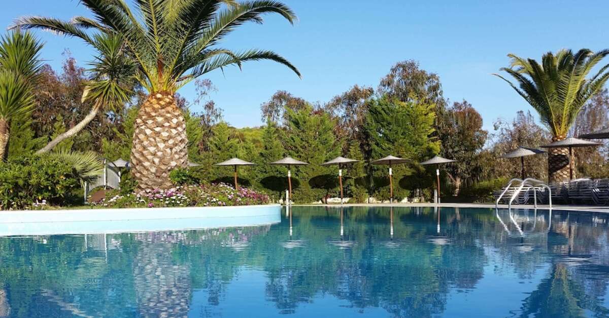 Een foto van het zwembad bij Alexandros Palace Hotel & Suites