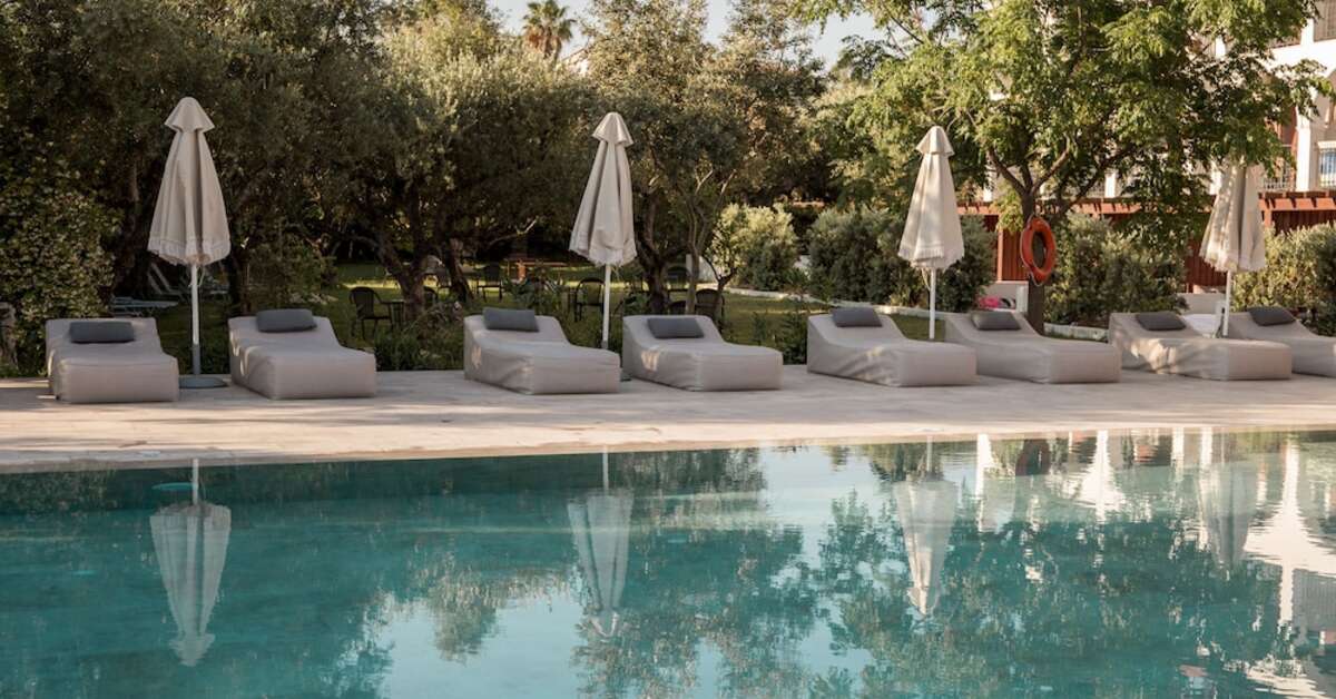 Een foto van het zwembad bij Castelli Hotel