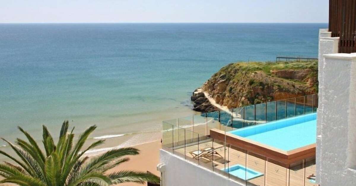 Een foto van het zwembad bij Rocamar Exclusive Hotel & Spa