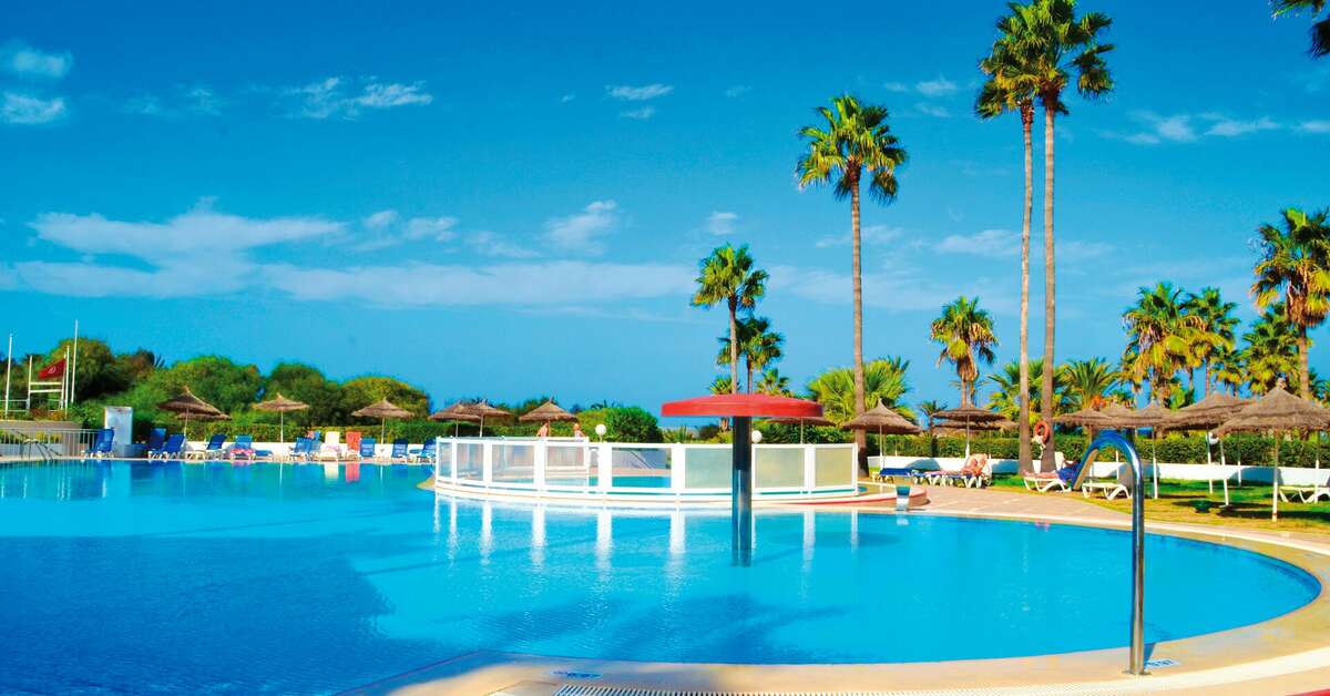 Een foto van het zwembad bij Hotel Club Tropicana & Spa