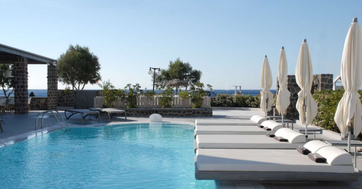 Een foto van het zwembad bij Aqua Blue Hotel