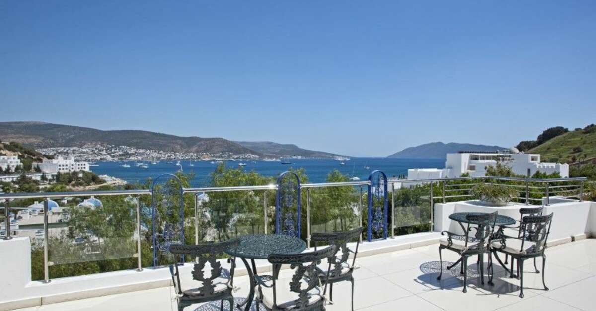 Een foto van het terras bij Salmakis Resort & Spa