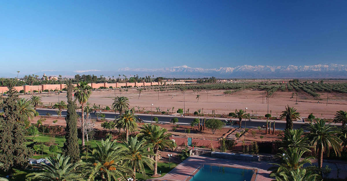 Een foto van het zwembad bij Ibis Marrakech Palmeraie