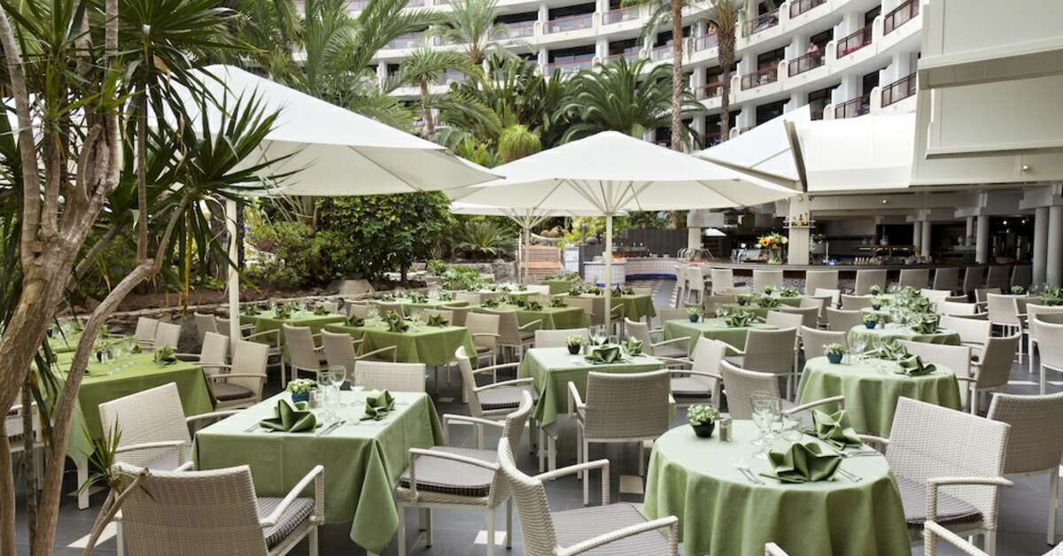 Ein Foto von der Terrasse im Seaside Sandy Beach