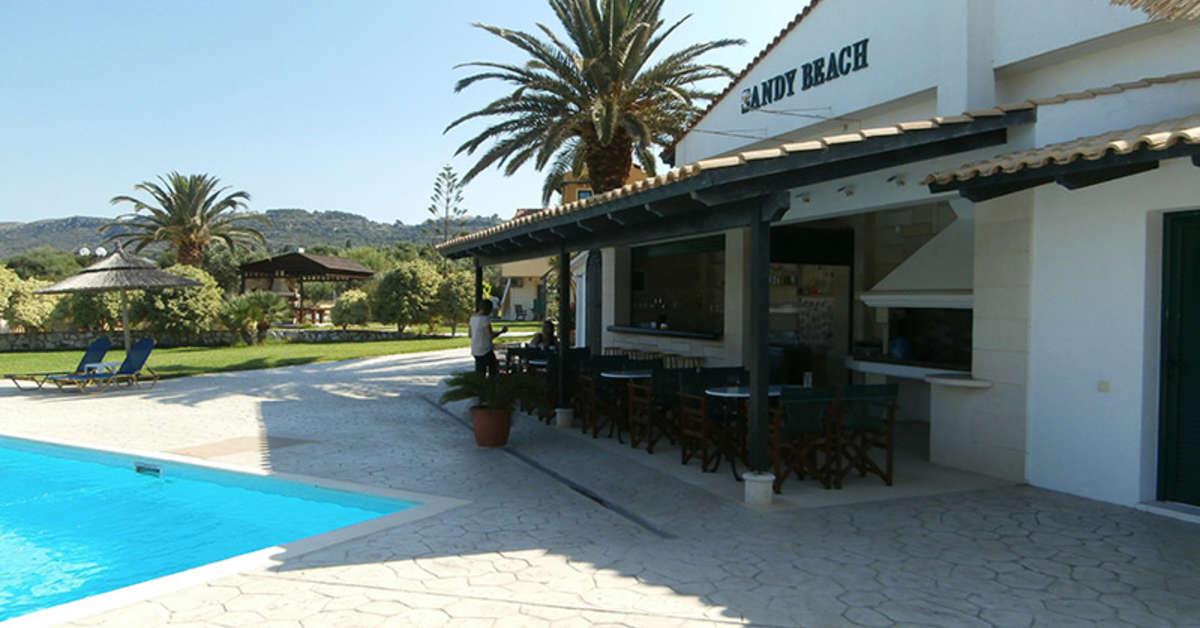 Een foto van het zwembad bij Sandy Beach Villas & Appartementen