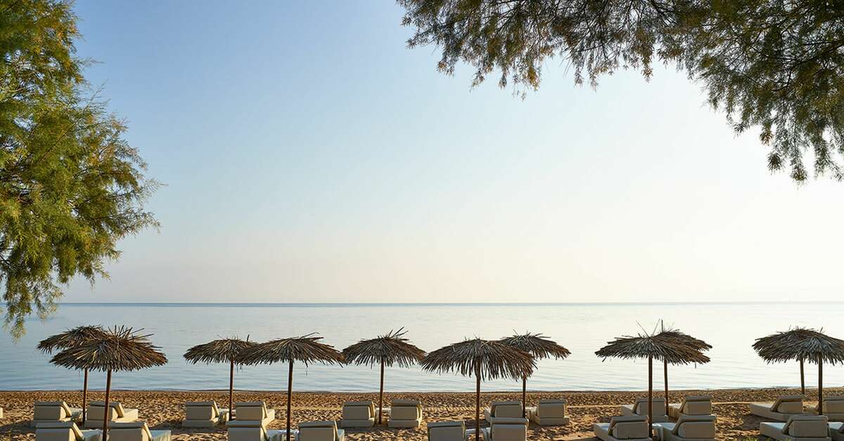 Een foto van het strand bij Grecotel Casa Marron