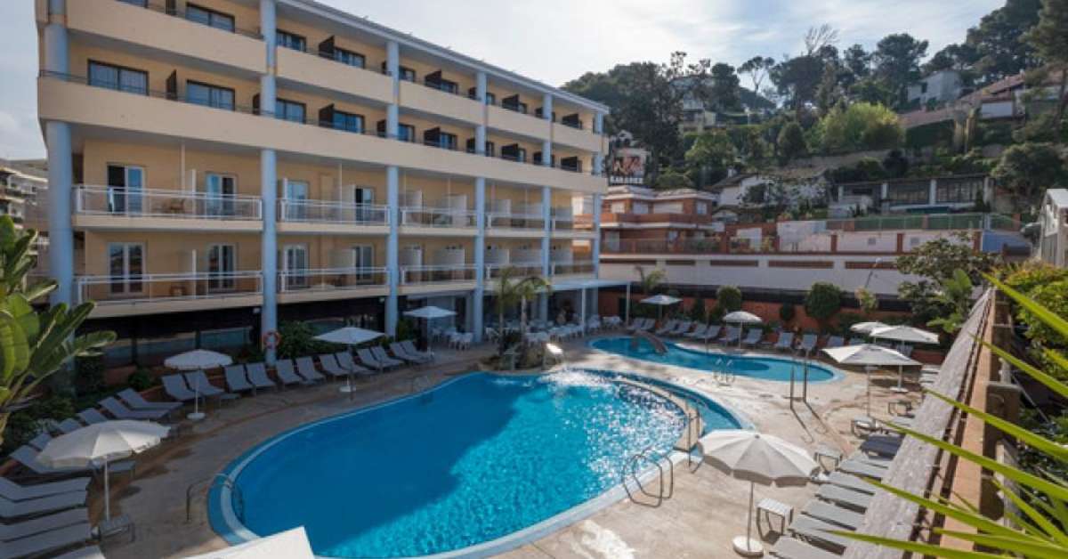 Een foto van het zwembad bij Hotel Rosamar & Spa