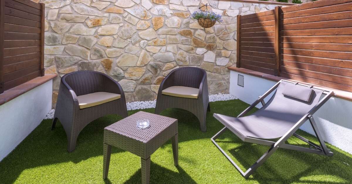 Een foto van het terras bij Hotel GHT Neptuno