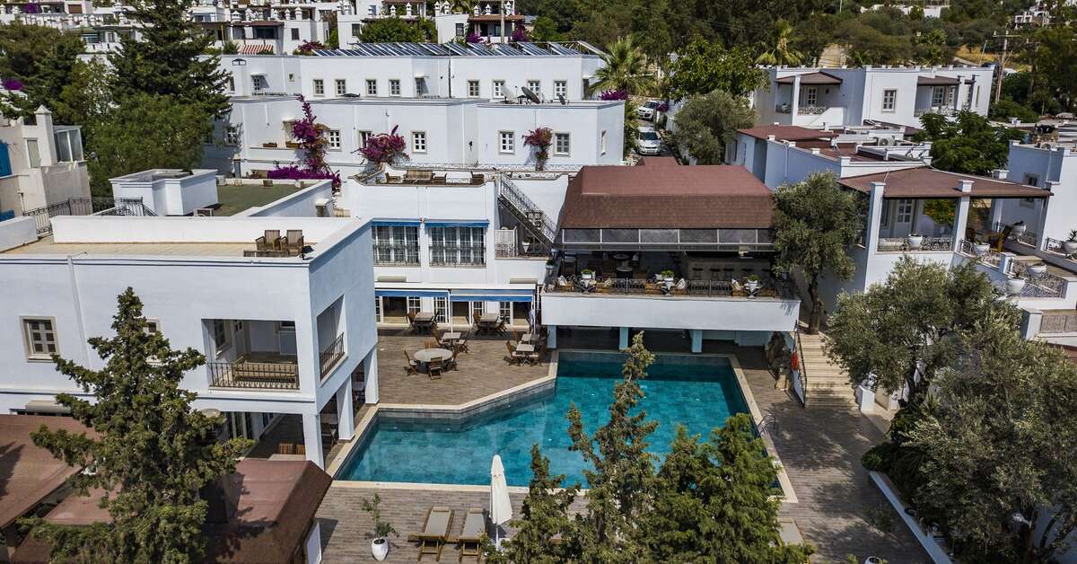 Een foto van het zwembad bij Manzara Boutique Hotel