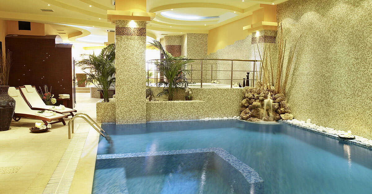 Een foto van het zwembad bij Alexandros Palace Hotel & Suites