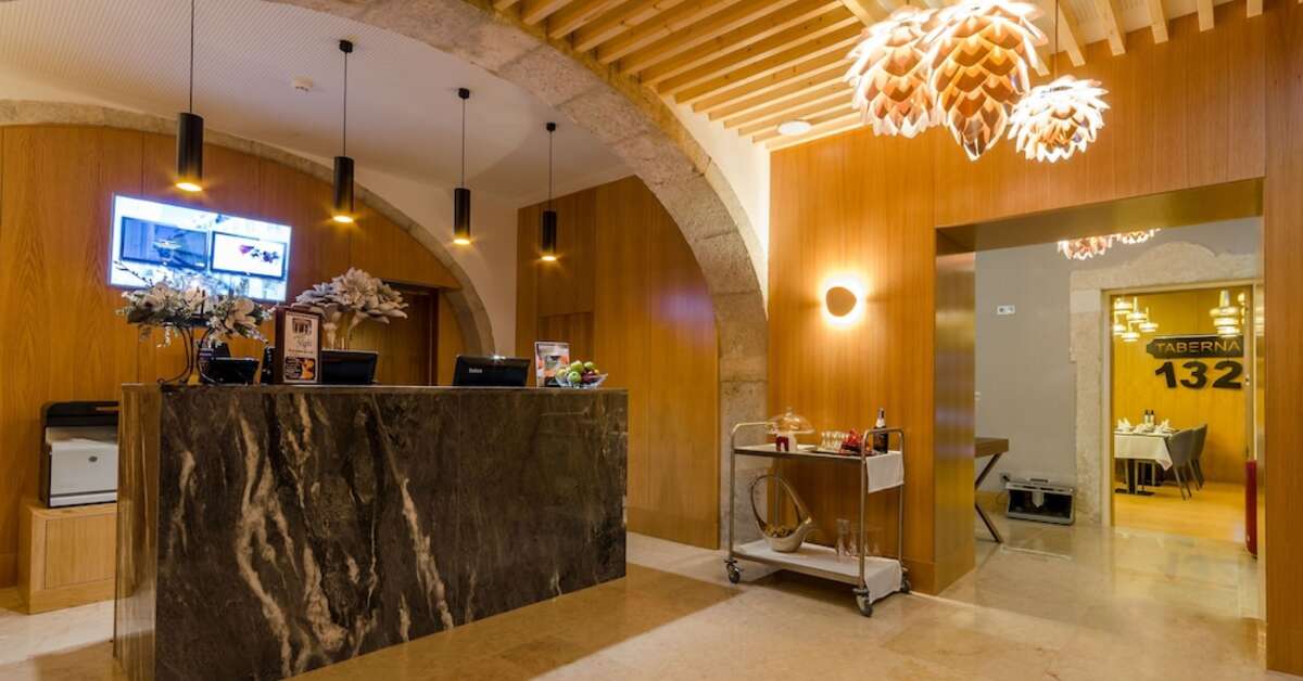 Een foto van het interieur van Behotelisboa