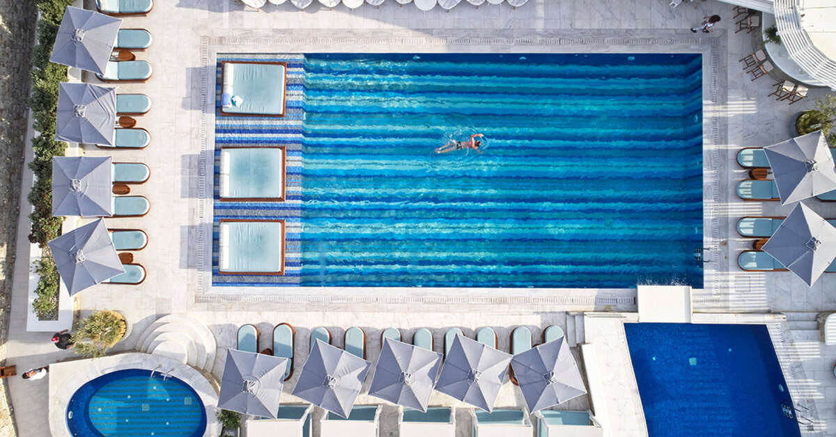 Een foto van het zwembad bij Myconian Kyma Design Hotel