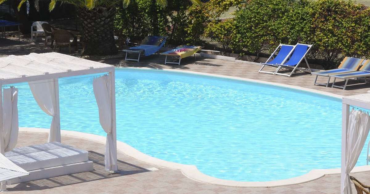Ein Foto vom Pool im Hotel Village Fior di Sardegna