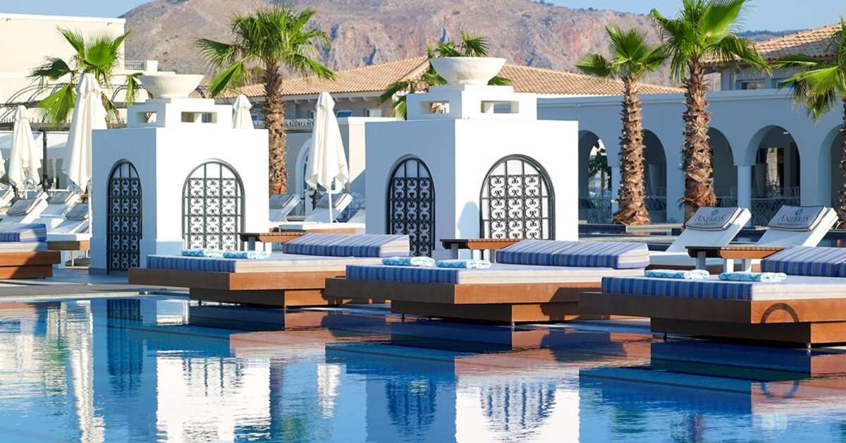 Een foto van het zwembad bij Anemos Luxury Grand Resort