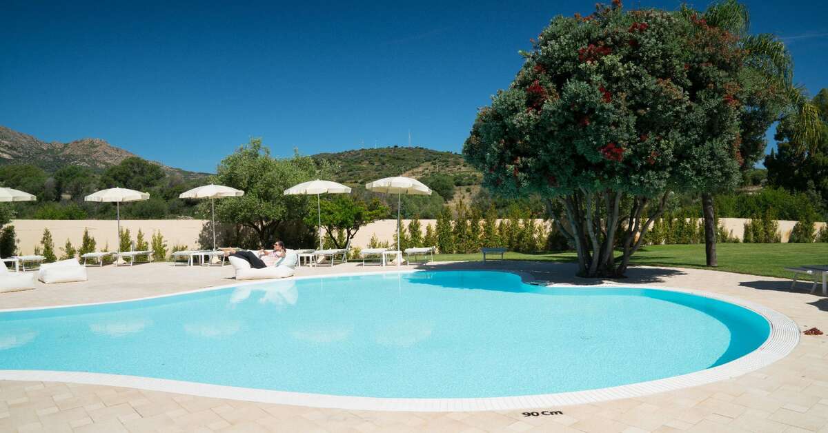 Een foto van het zwembad bij San Teodoro Hotel