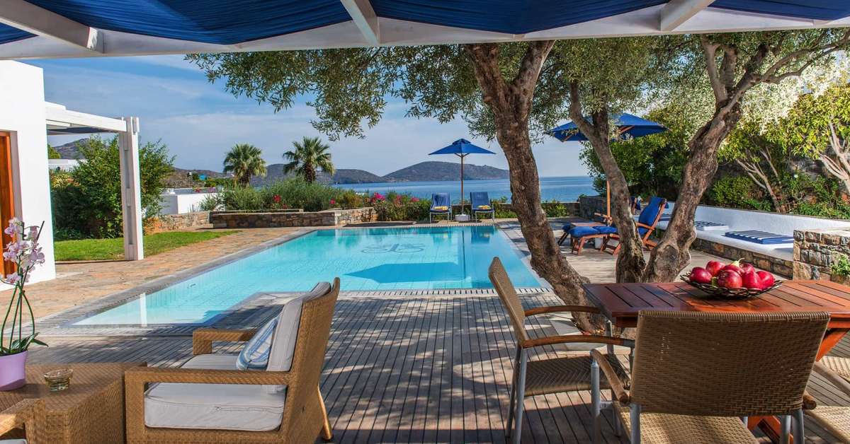 Een foto van het zwembad bij Elounda Beach Hotel & Villas