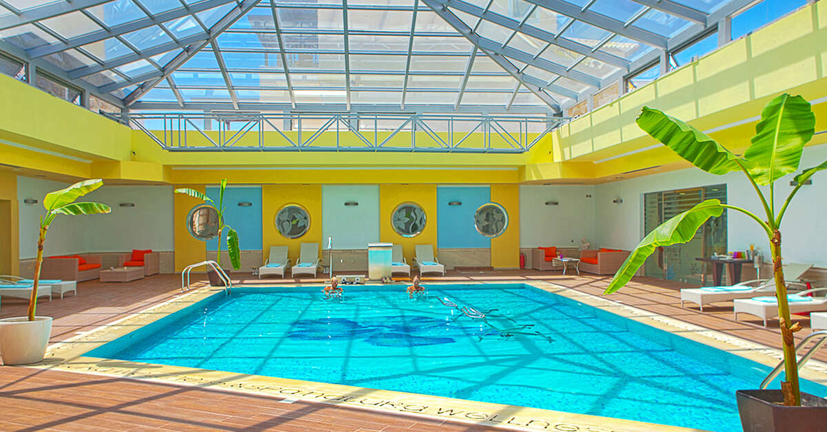 Een foto van het zwembad bij Natura Village Hotel & Spa