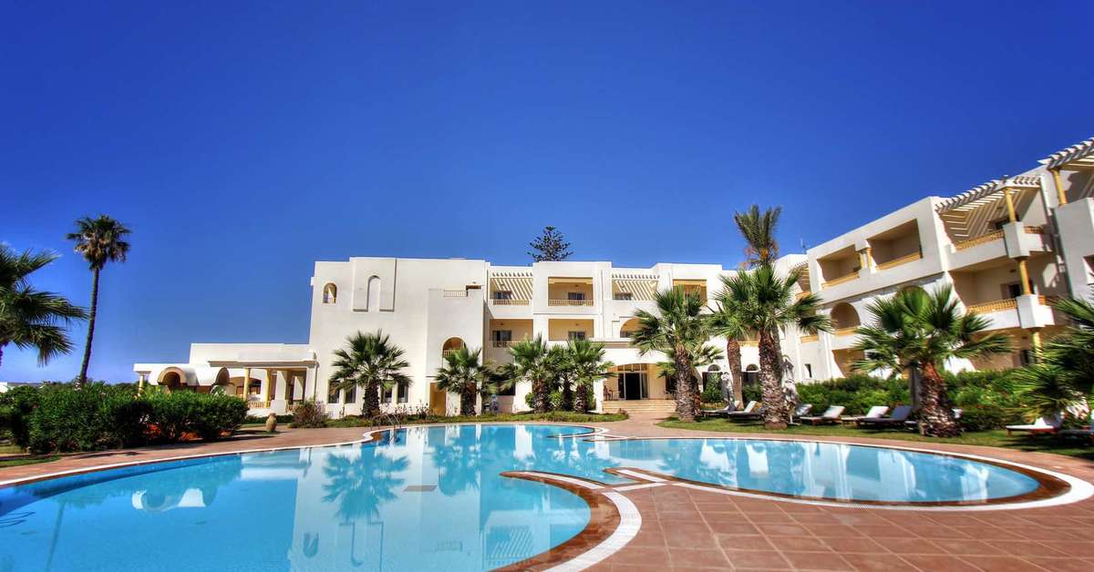 Een foto van het zwembad bij Delfino Beach Resort & Spa