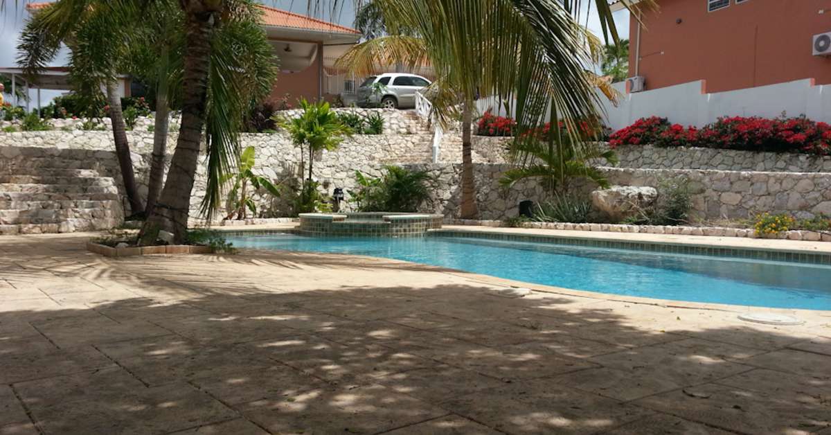 Een foto van het zwembad bij Curinjo Resort