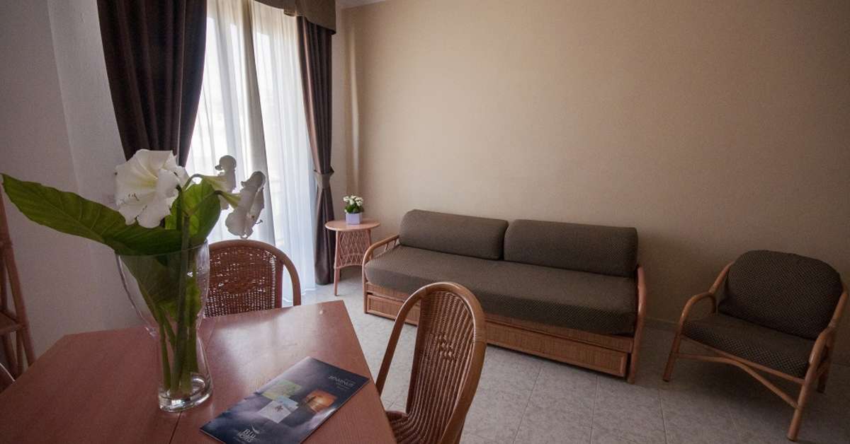 Een foto van het interieur van Rina Hotel
