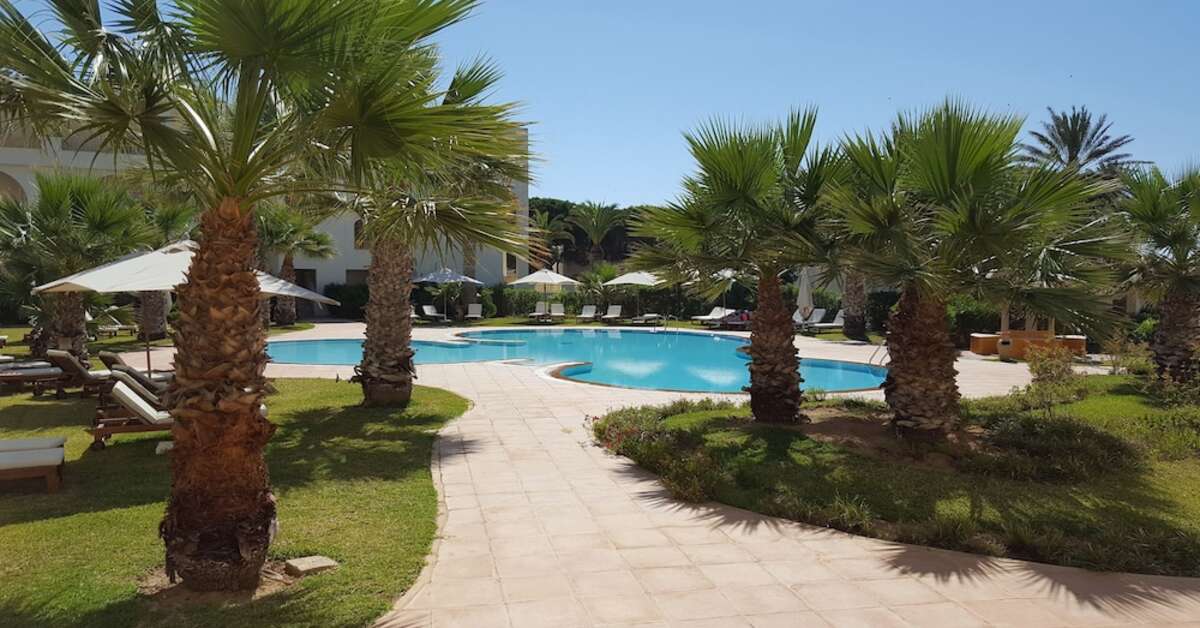 Een foto van het zwembad bij Delfino Beach Resort & Spa