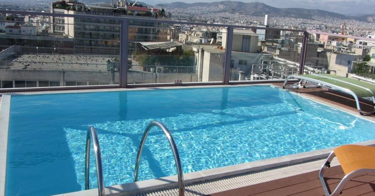 Een foto van het zwembad bij Novus City Hotel