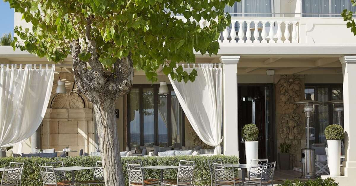 Een foto van het terras bij Mon Repos Palace Hotel