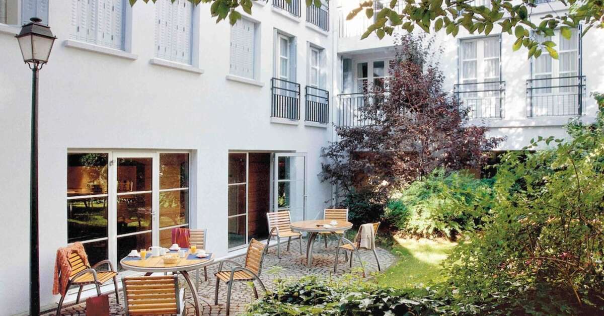 Een foto van het terras bij Aparthotel Adagio Paris Montmartre