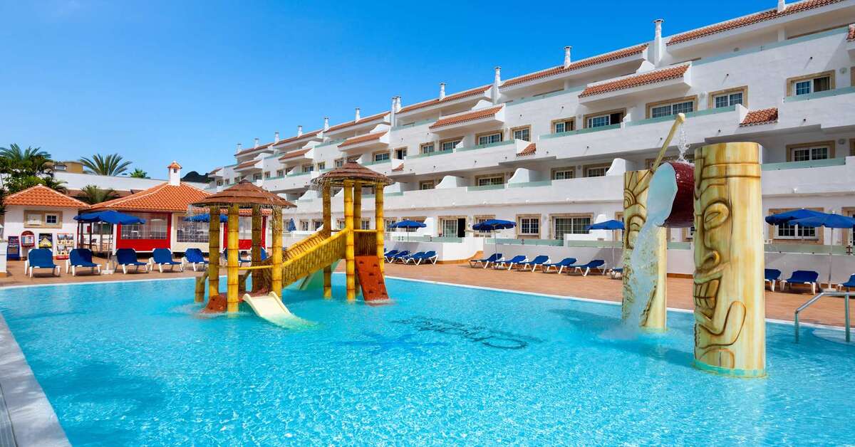 Een foto van het zwembad bij Chatur Playa Real Resort