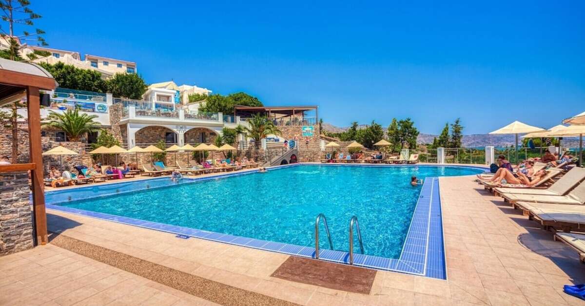 Een foto van het zwembad bij Elounda Water Park Residence Hotel