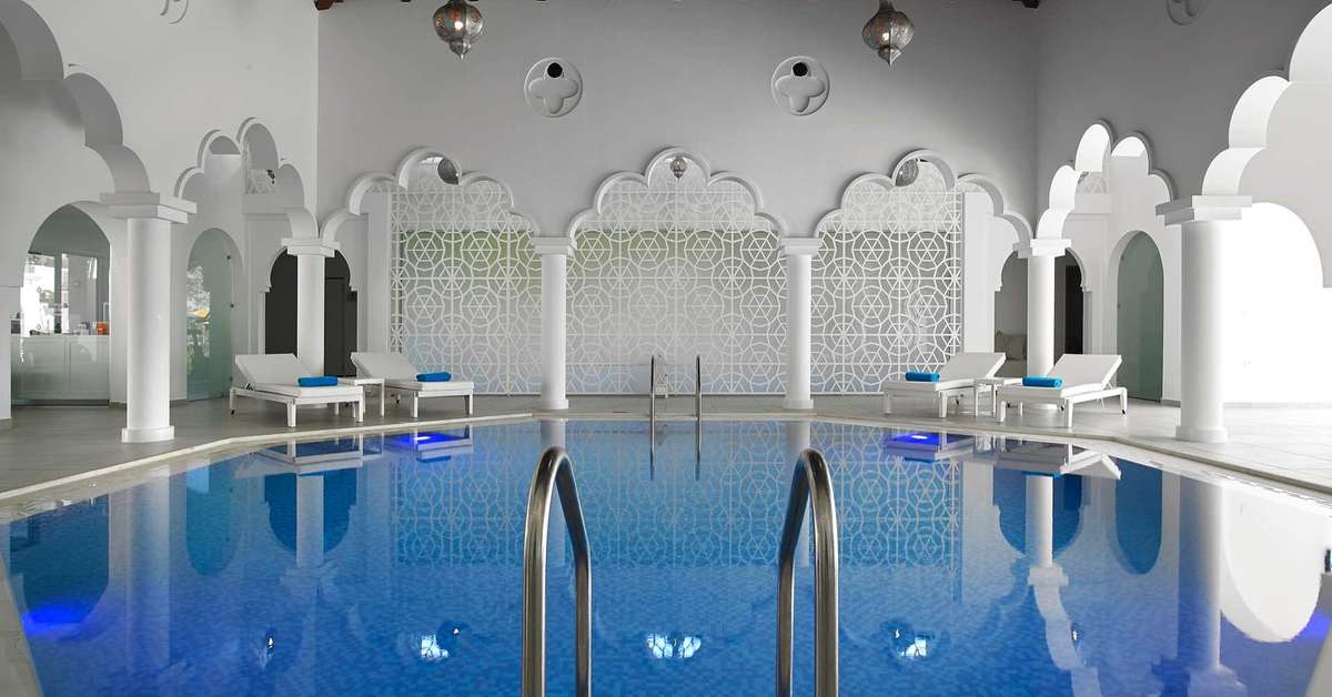 Een foto van het zwembad bij Anemos Luxury Grand Resort