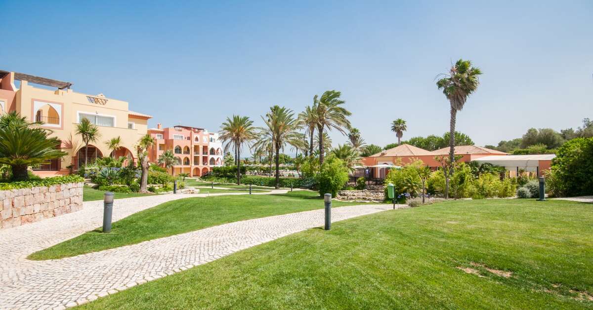 Een foto van het terras bij Jardim da Meia Praia