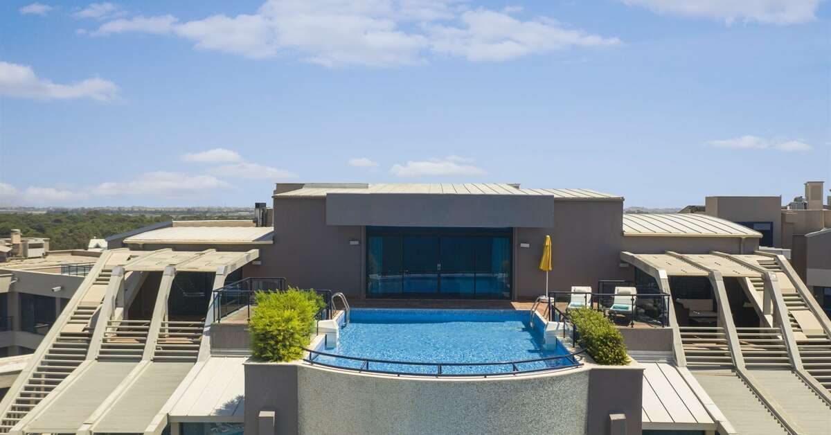 Een foto van het zwembad bij Susesi Luxury Resort