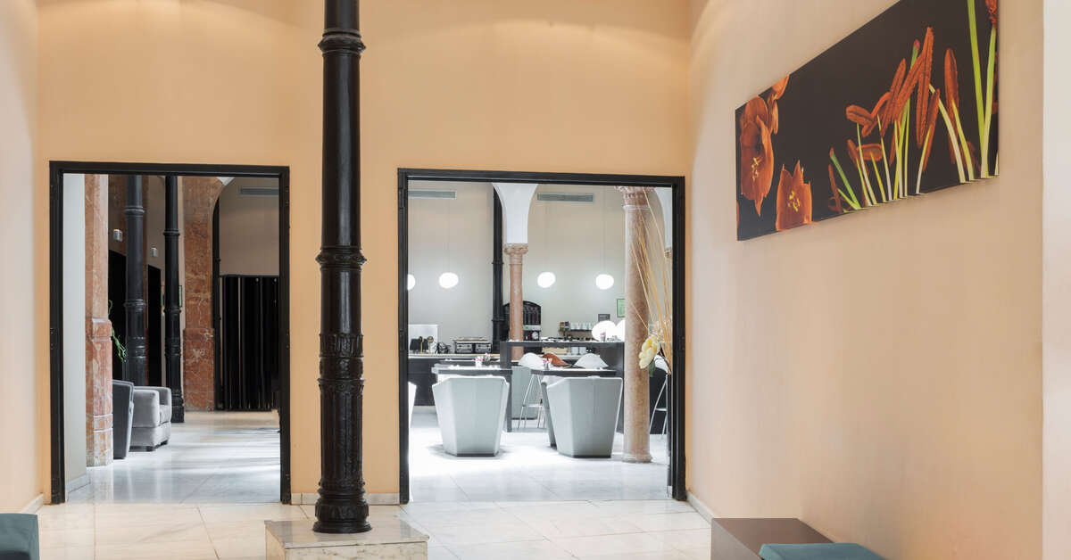Een foto van het interieur van Petit Palace Plaza Malaga Hotel