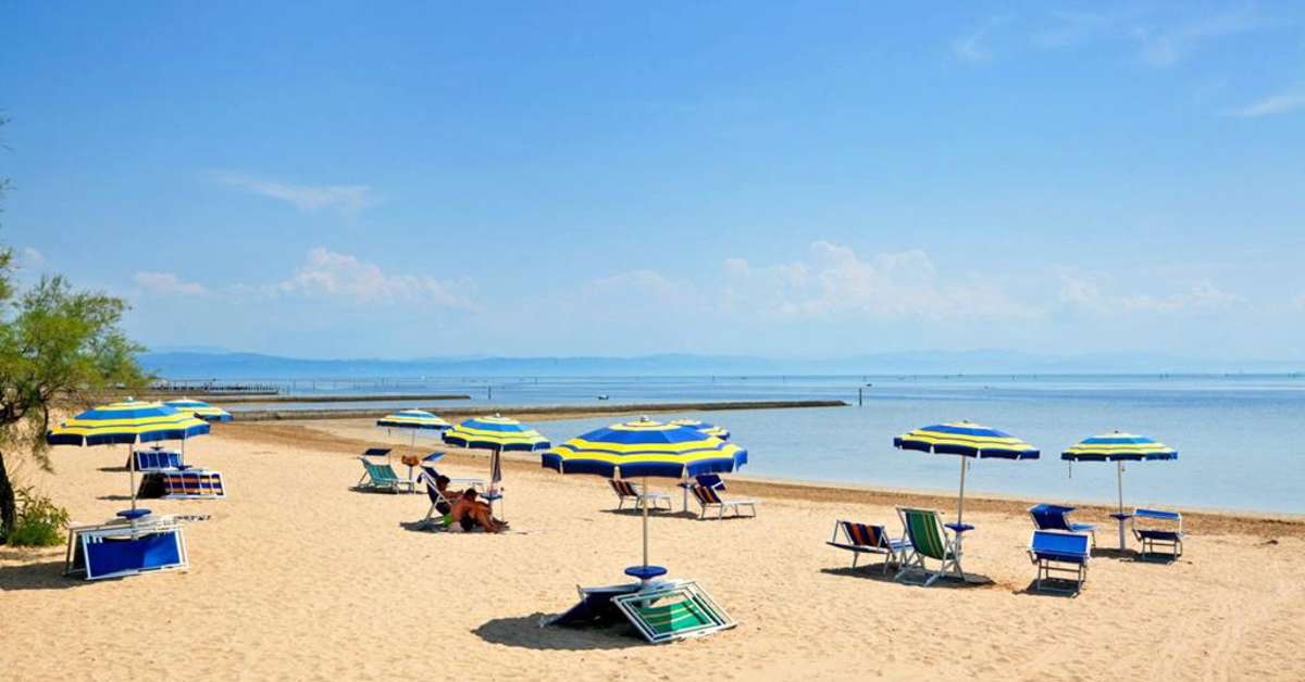 Een foto van het strand bij Club Del Sole Tenuta Primero Grado Family Collection