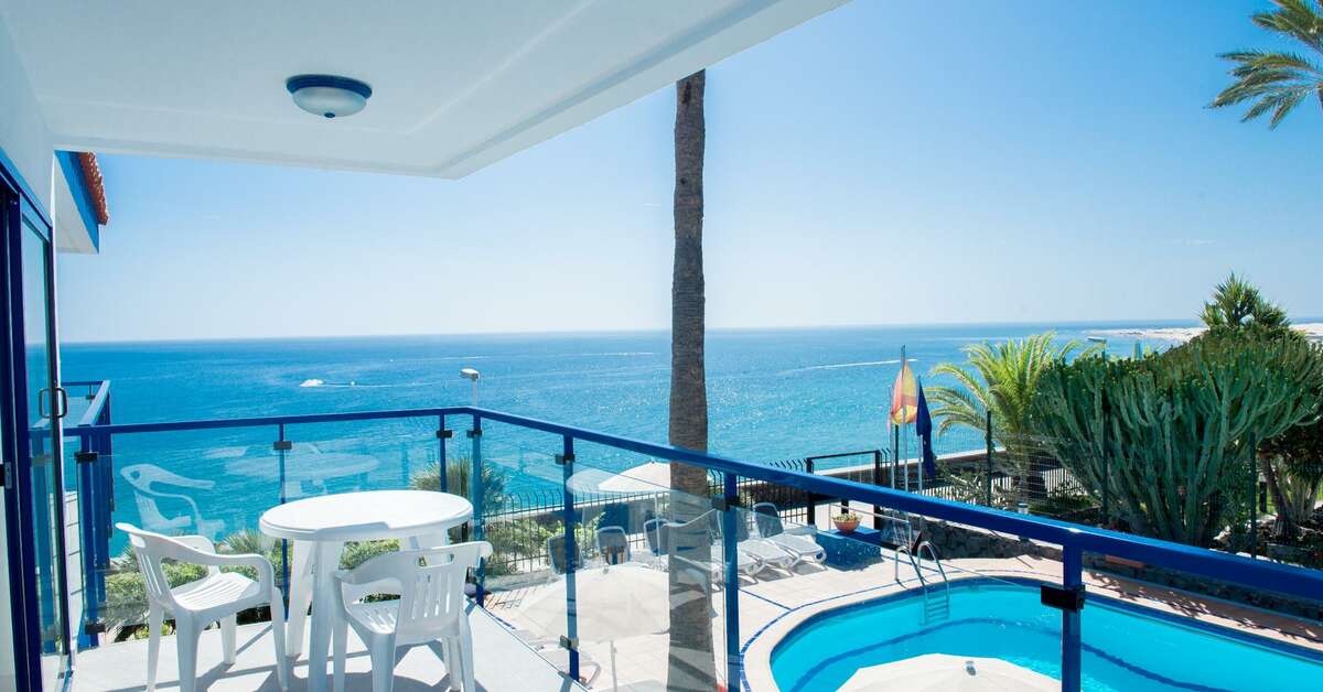 Een foto van het zwembad bij Appartementen Los Caribes I
