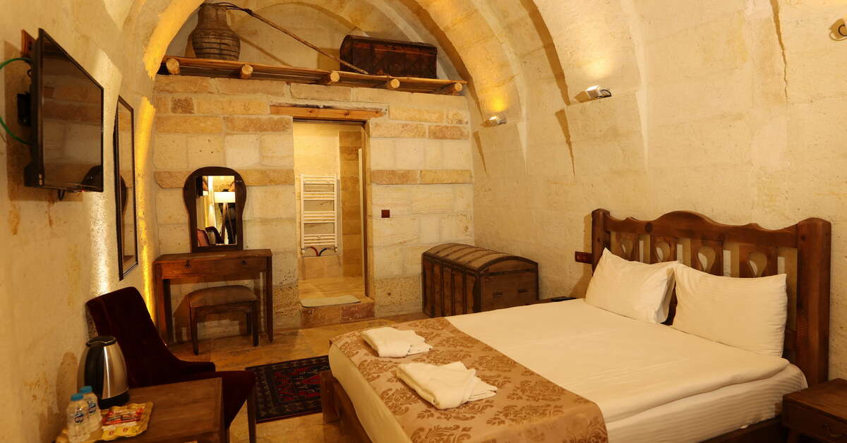 Ein Foto Harkasos Cave Hotel