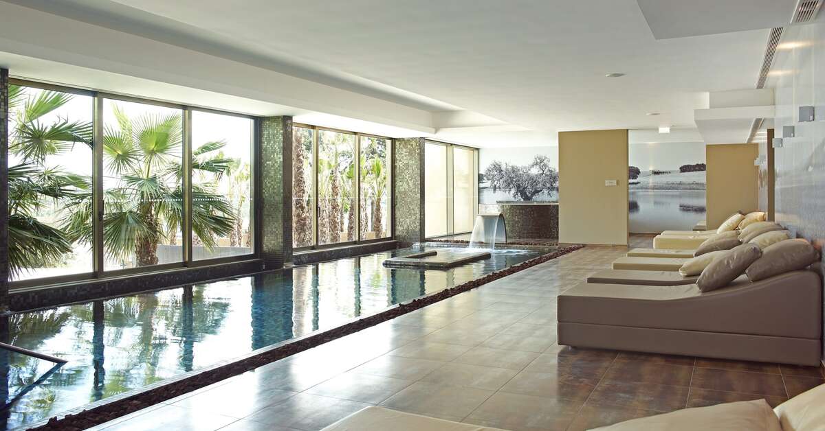 Een foto van het zwembad bij AP Lago Montargil Conference & Spa