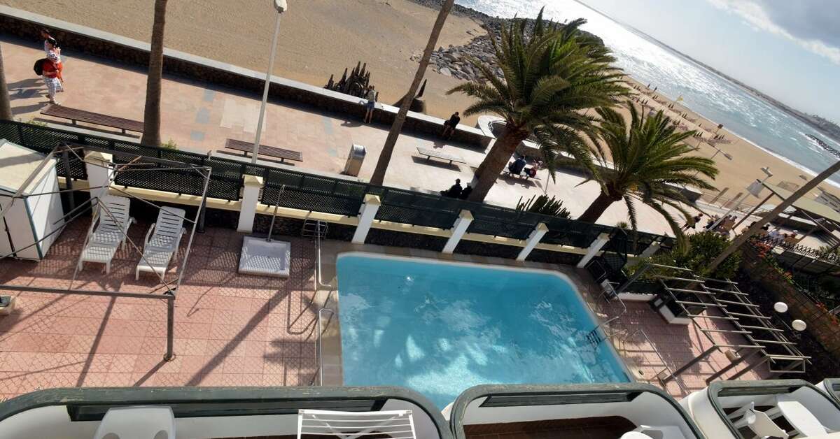 Een foto van het zwembad bij Olympia Club Appartementen