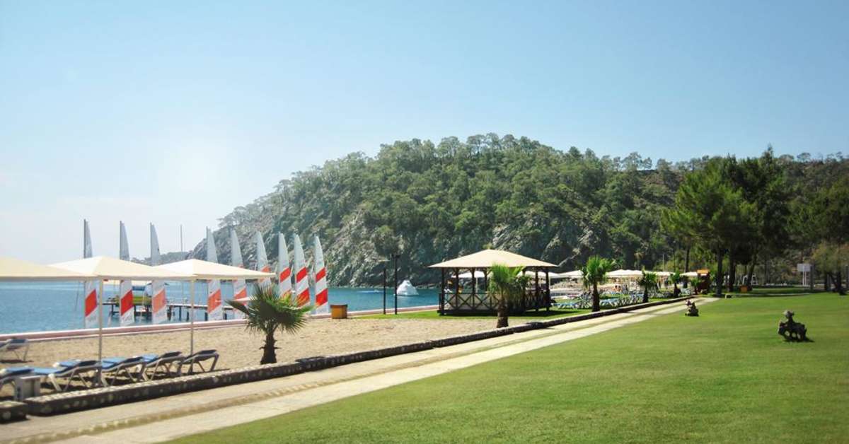 Een foto van het strand bij Robinson Club Camyuva
