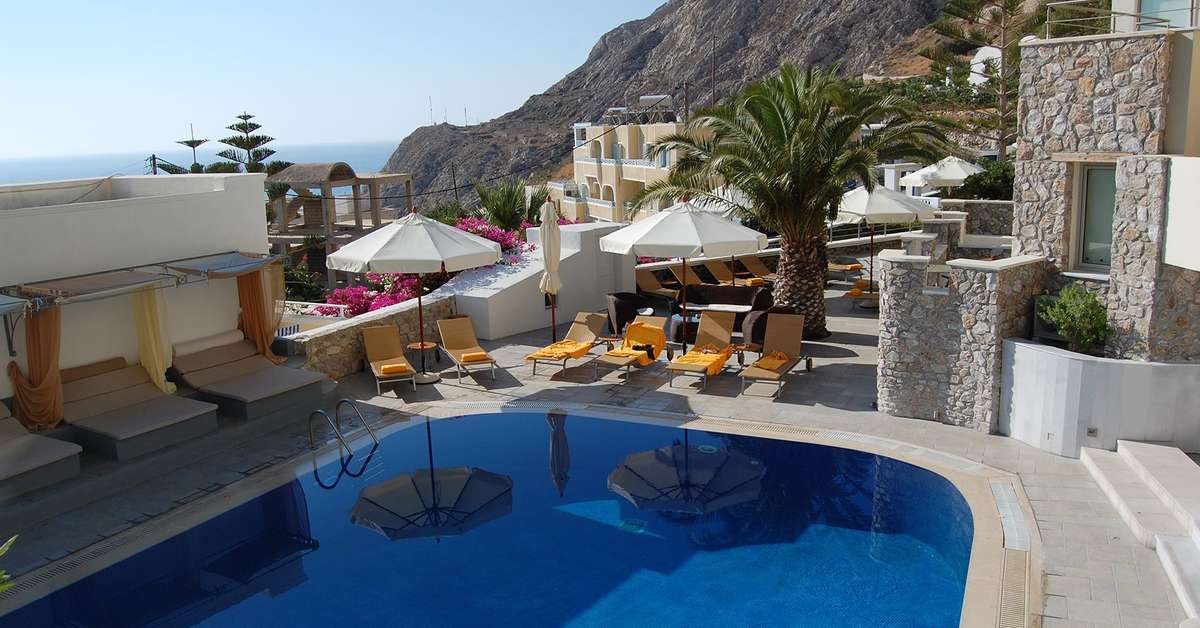 Een foto van het zwembad bij Antinea Suites & Spa