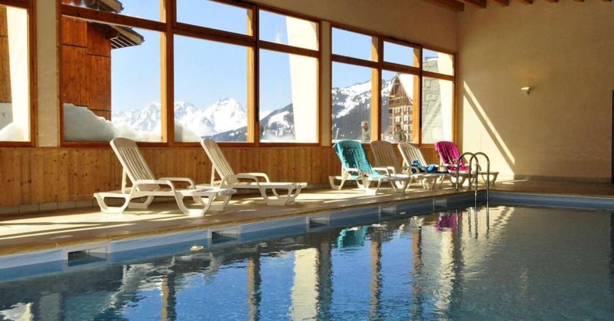 Een foto van het zwembad bij Goelia Les 4 Vallees