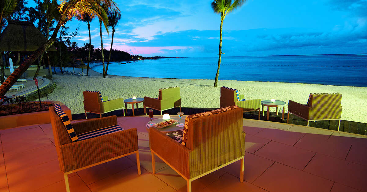 Een foto van het terras bij Ambre Resort & Spa