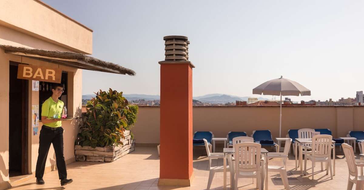 Een foto van het terras bij H-Top Royal Sun Suites