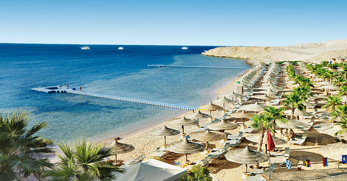 Een foto van het strand bij Savoy Hotel