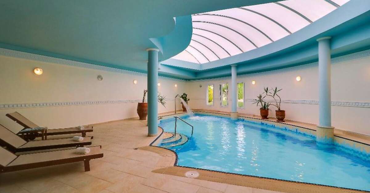 Een foto van het zwembad bij Hotel Aegean Melathron Thalasso & Spa