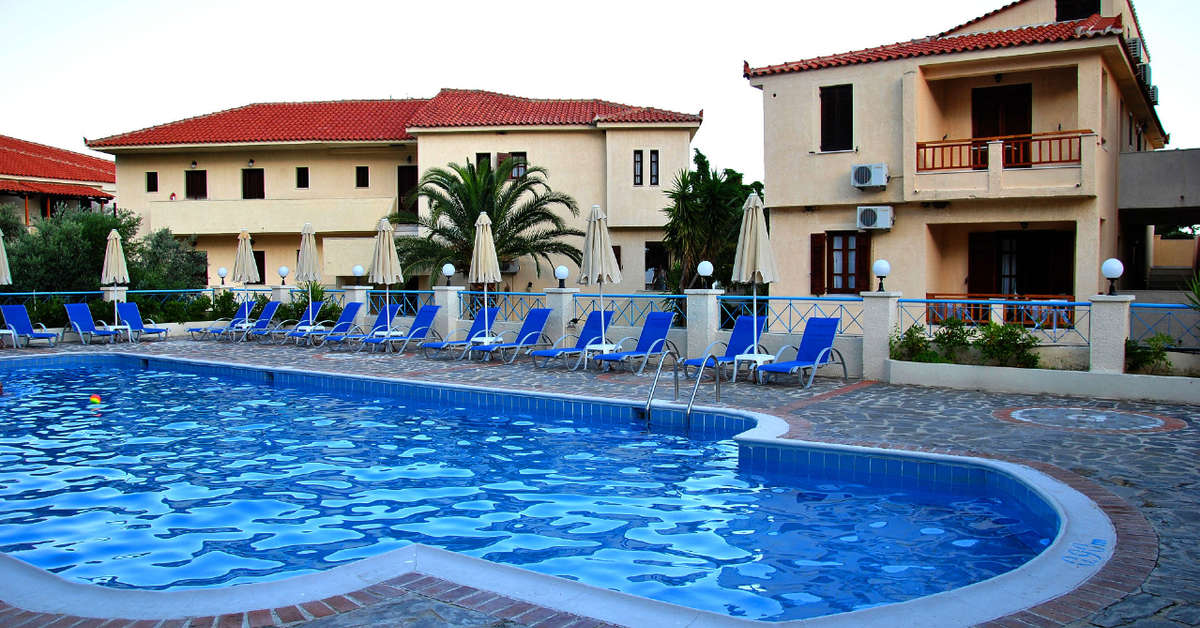Een foto van het zwembad bij Kampos Village Resort