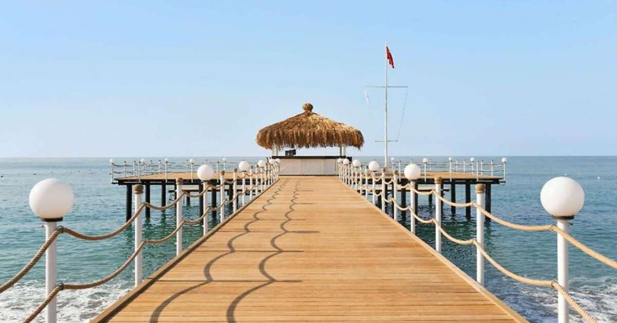 Een foto van het strand bij Ramada Resort by Wyndham Lara