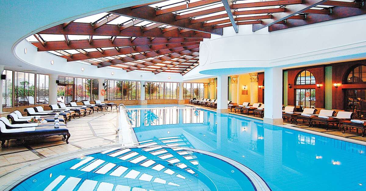 Een foto van het zwembad bij Delphin Diva Premiere Hotel