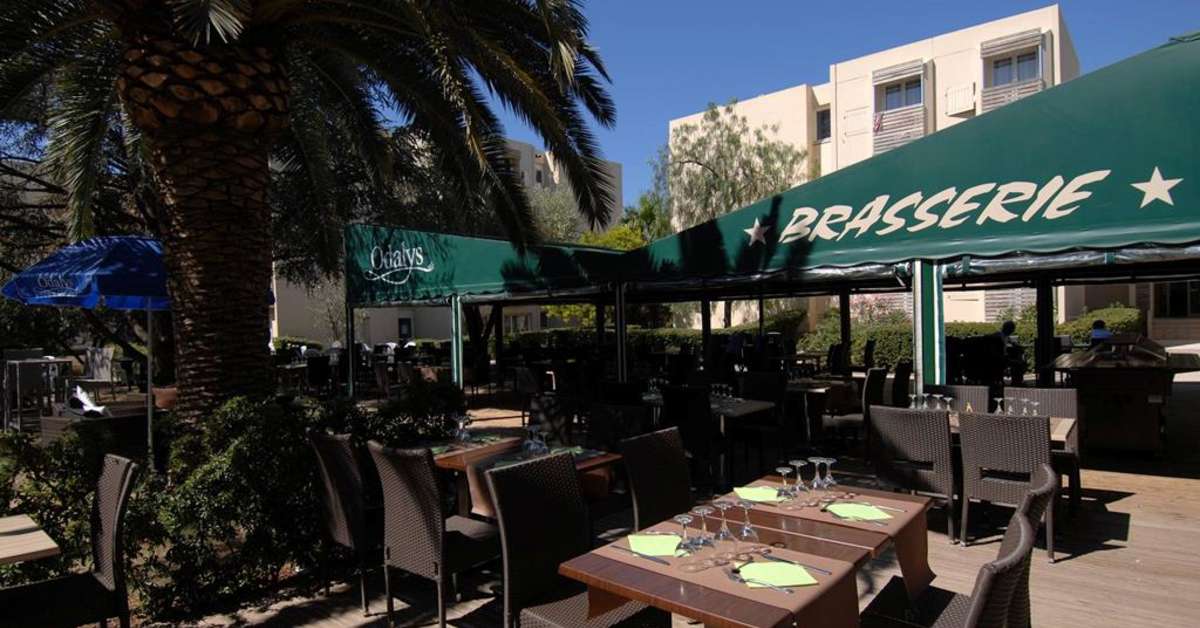 Een foto van het terras bij Ile D'Or & Les Oceanides